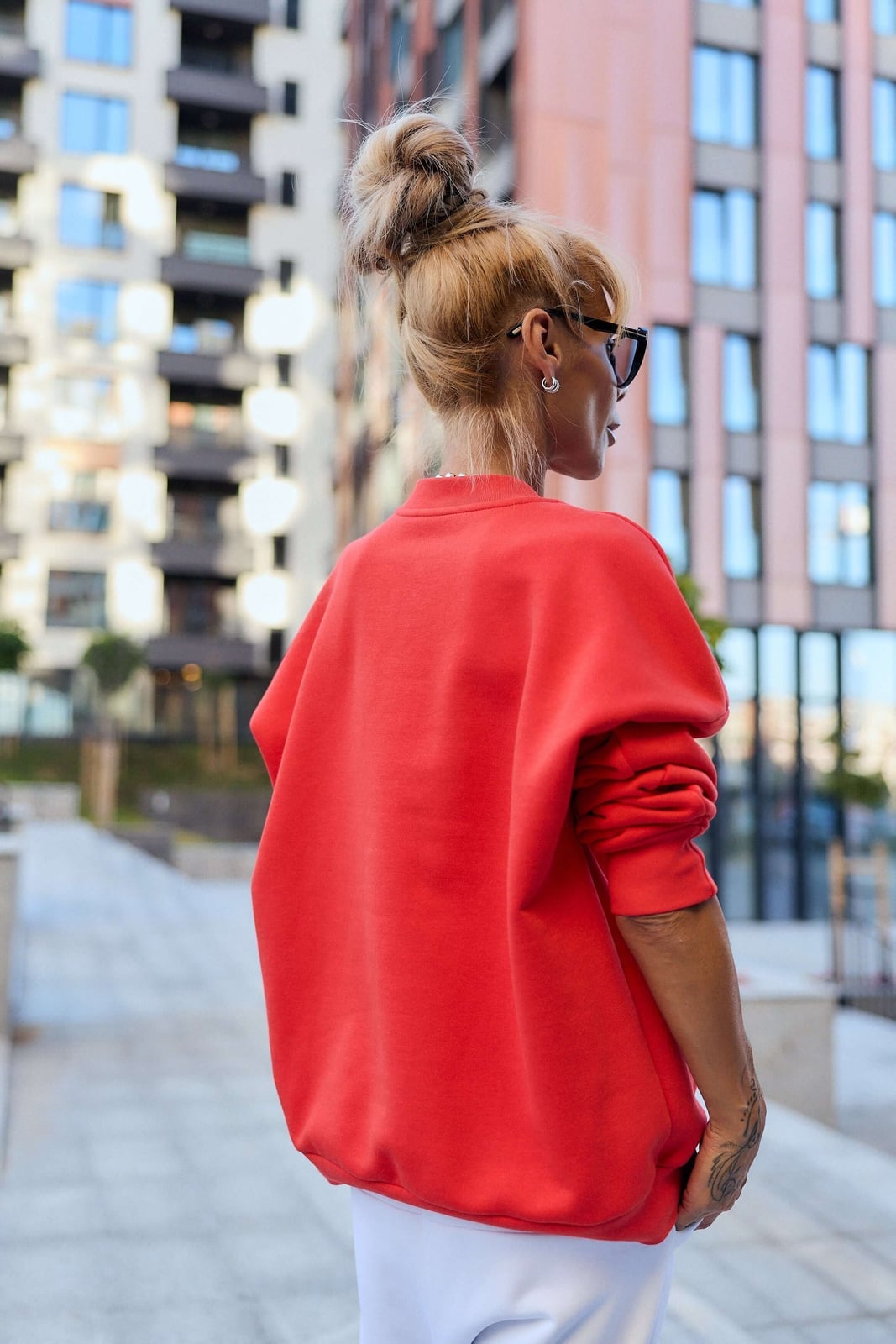 Vibrant Red Oversized Sweatshirt With White Pants — Trendy Red Sweater Outfit