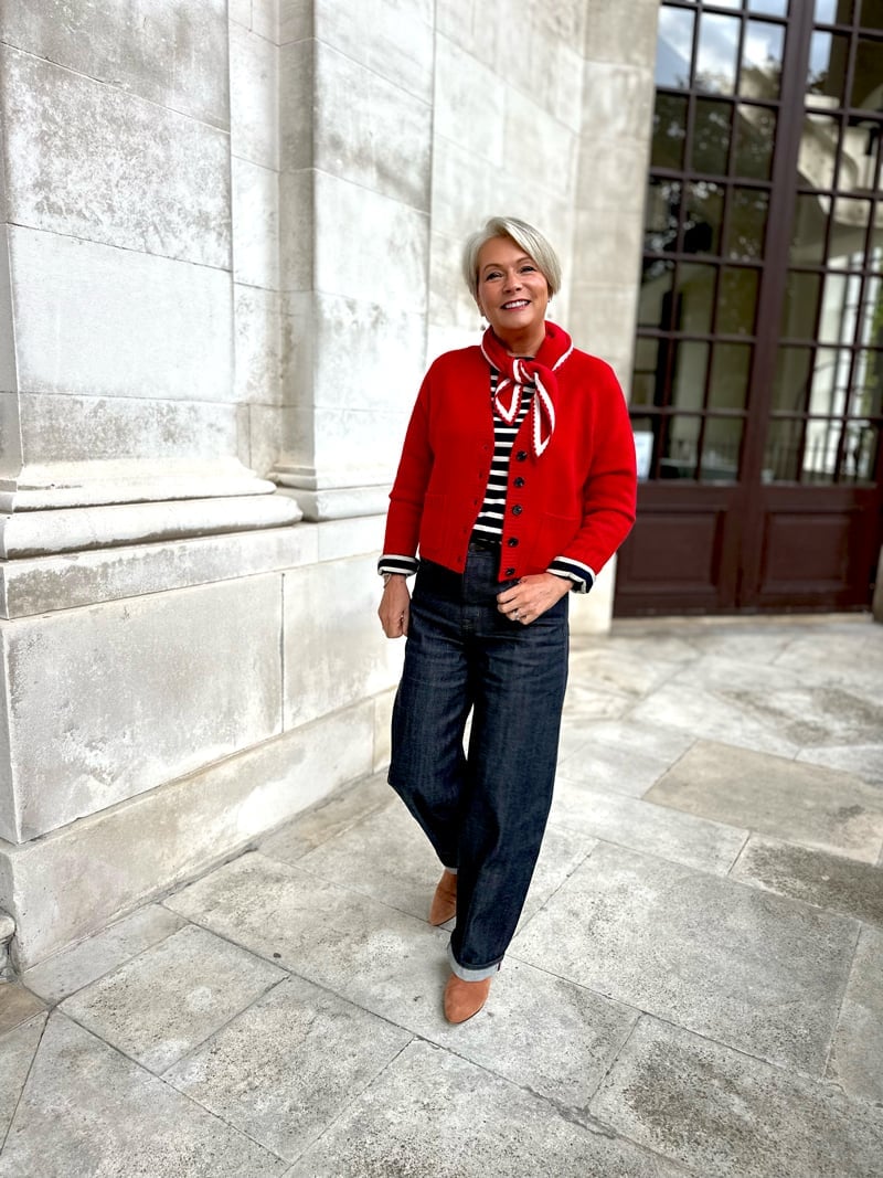 Bright Red Cardigan Over Striped Shirt With Wide-Leg Jeans — Trendy Red Sweater Outfit