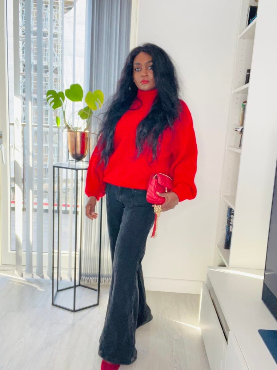 Red Turtleneck Sweater With Balloon Sleeves and Flared Jeans — Trendy Red Sweater Outfit
