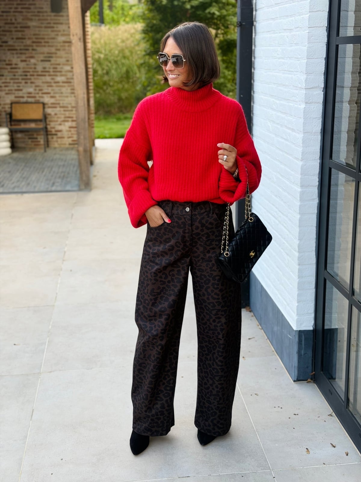Chunky Red Turtleneck Sweater With Leopard Print Pants — Trendy Red Sweater Outfit