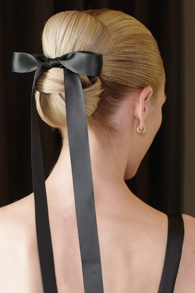 Sleek Blonde Chignon With Large Bow — Trendy Ribbon Hair