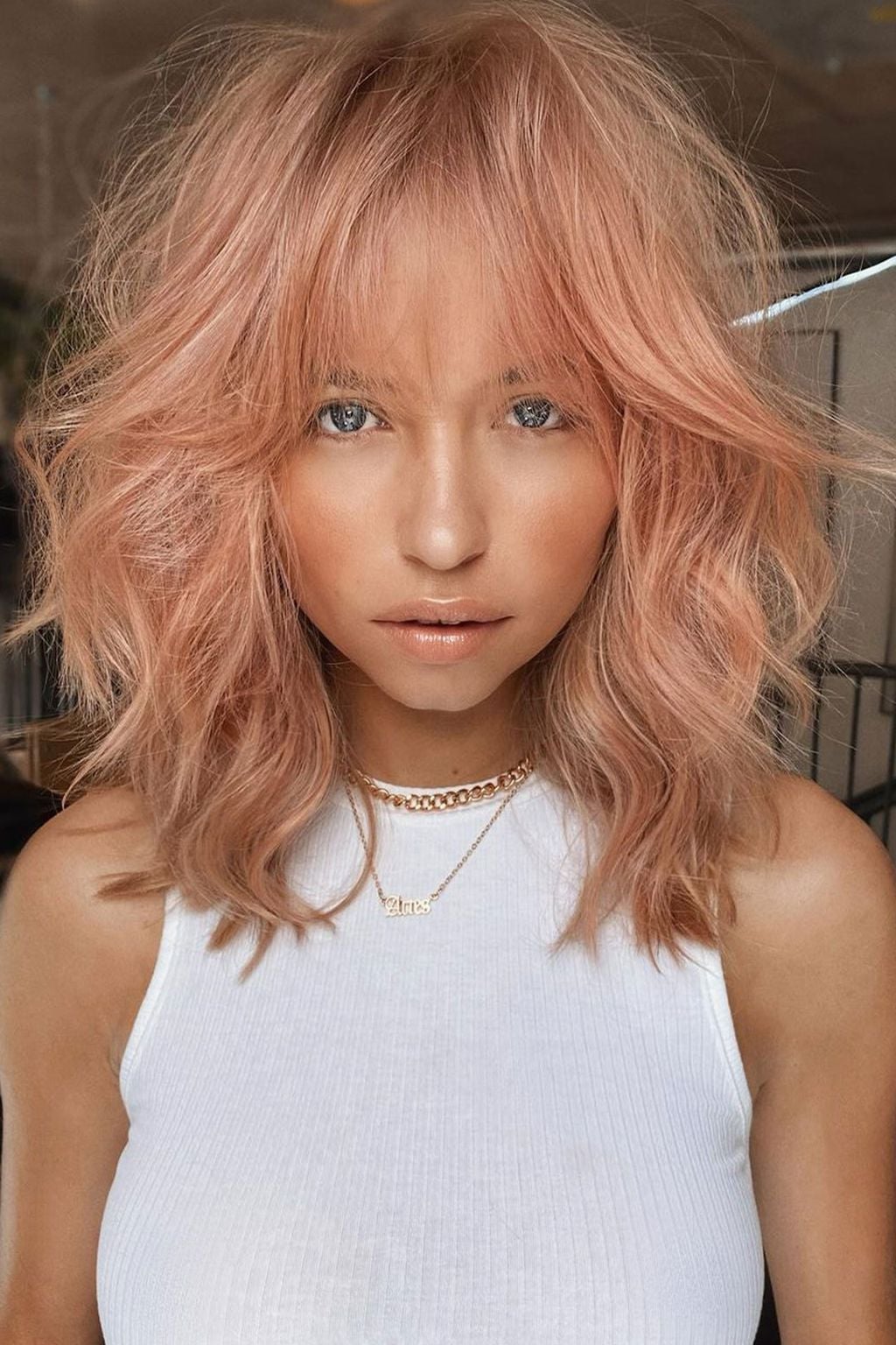 Collarbone Shag With Curtain Bangs Collarbone Shag With Curtain Bangs — Trendy Rose Gold Hair
