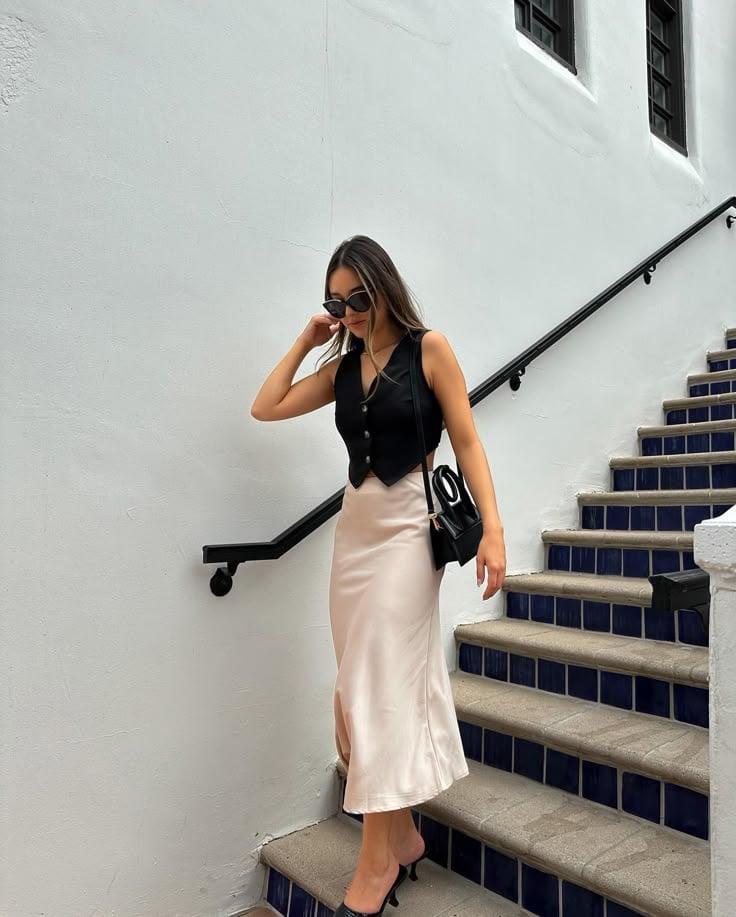 Beige Satin Midi Skirt With Black Vest Beige Satin Midi Skirt With Black Vest — Trendy Satin Skirt Outfits