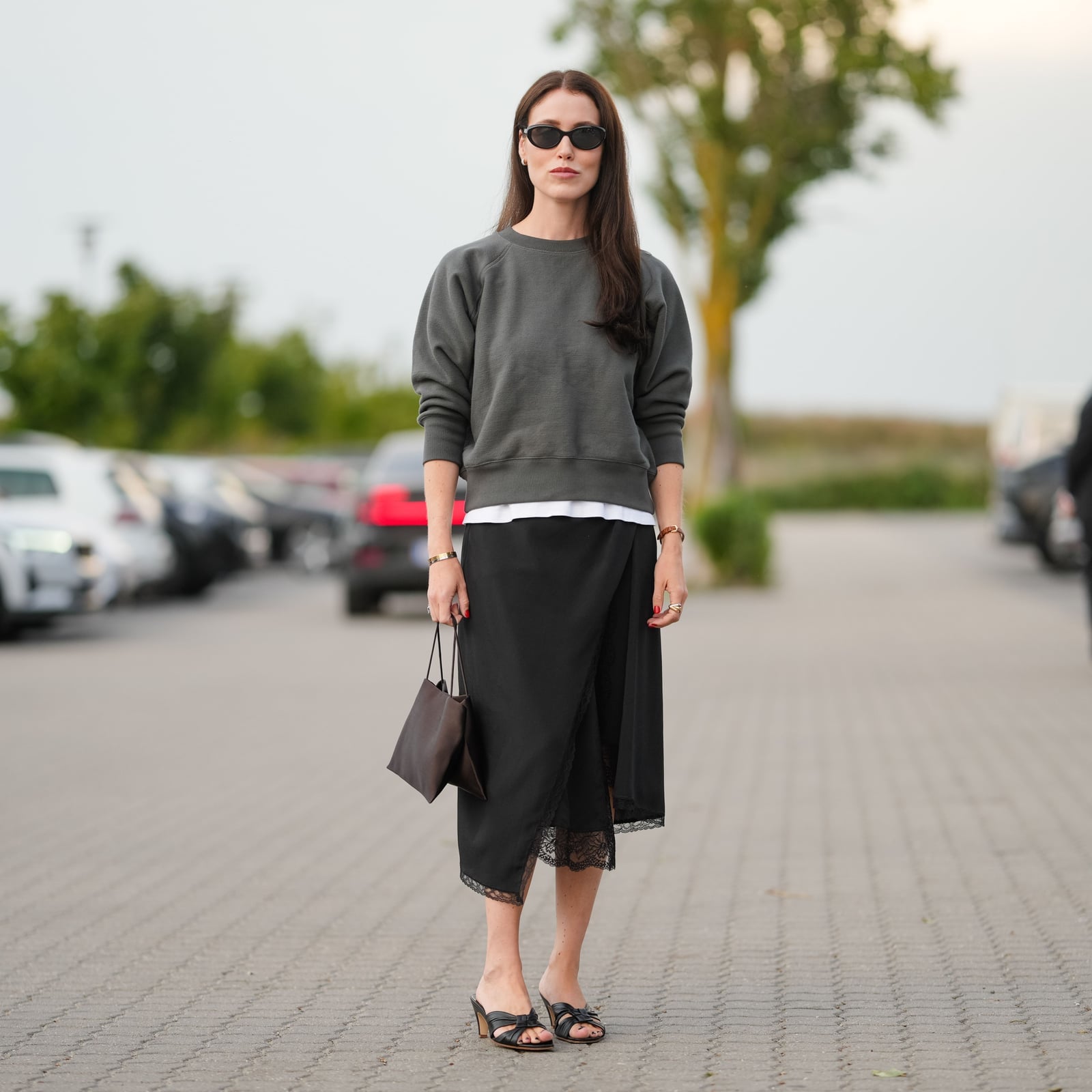Black Wrap Skirt With Lace Trim and Grey Sweatshirt Black Wrap Skirt With Lace Trim and Grey Sweatshirt — Trendy Satin Skirt Outfits