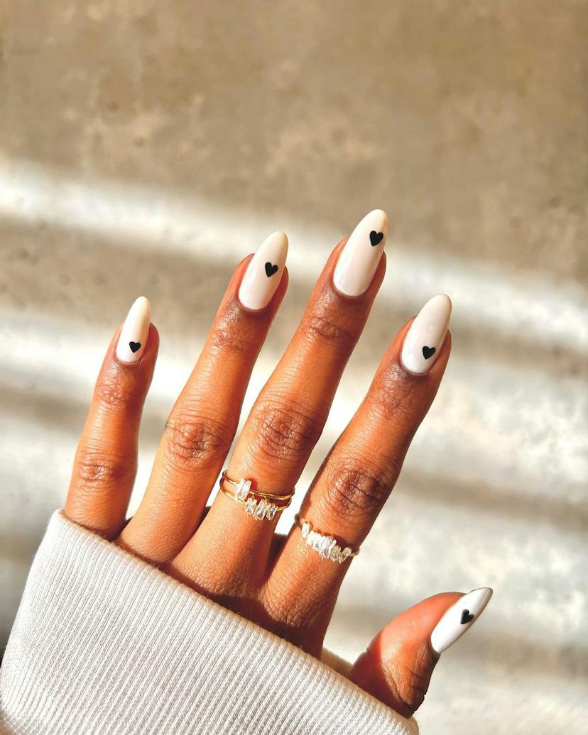 Creamy Off-White Black Heart Short Almond Nails — Trendy Short Almond Nails