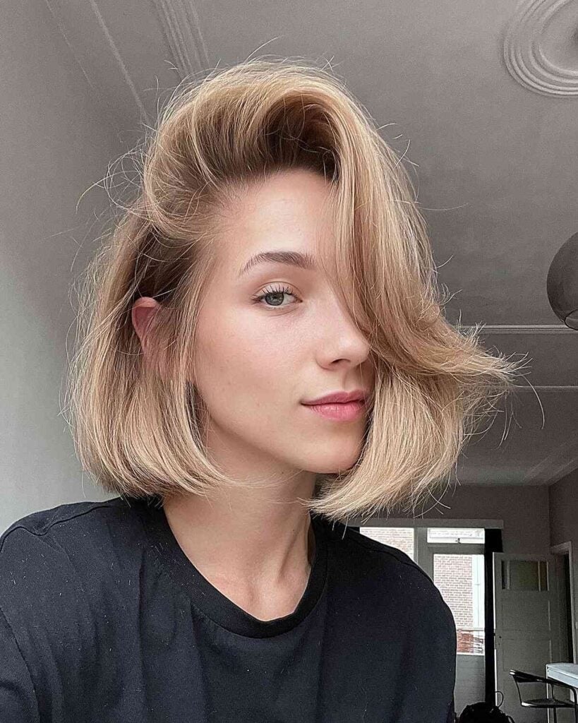 Ash Blonde Bob With Side-Swept Bangs, Close-Up Take — Trendy Short Bob