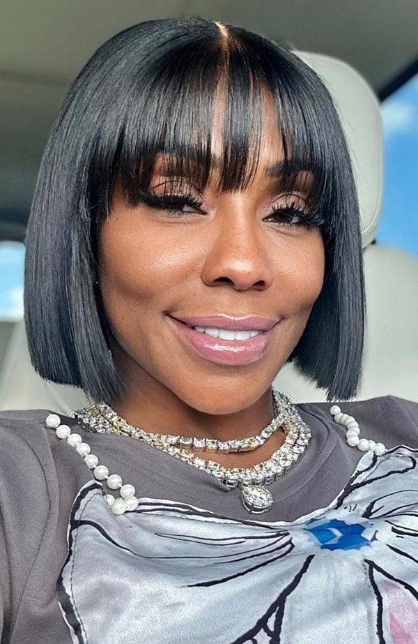 Black Blunt Bob With Wispy Bangs — Trendy Short Bob