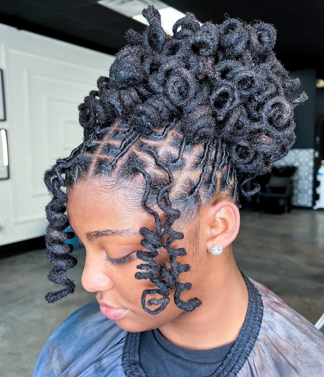 High Bun With Cascading Curly Tendrils — Trendy Short Locs