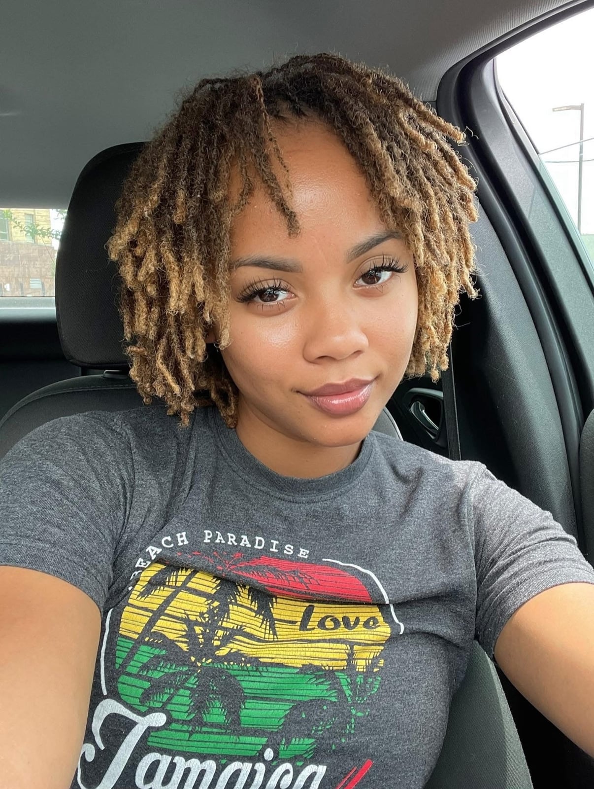 Collarbone Locs With Subtle Highlights and Curtain Bangs — Trendy Short Locs
