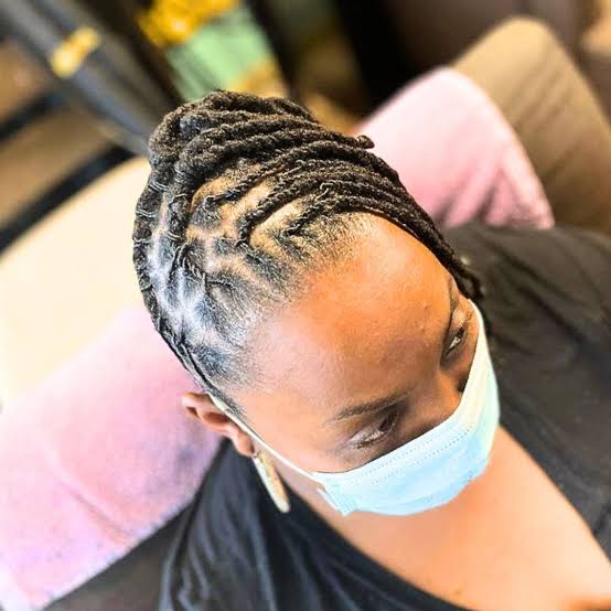 Wavy Collarbone Updo With Intricate Parting — Trendy Short Locs