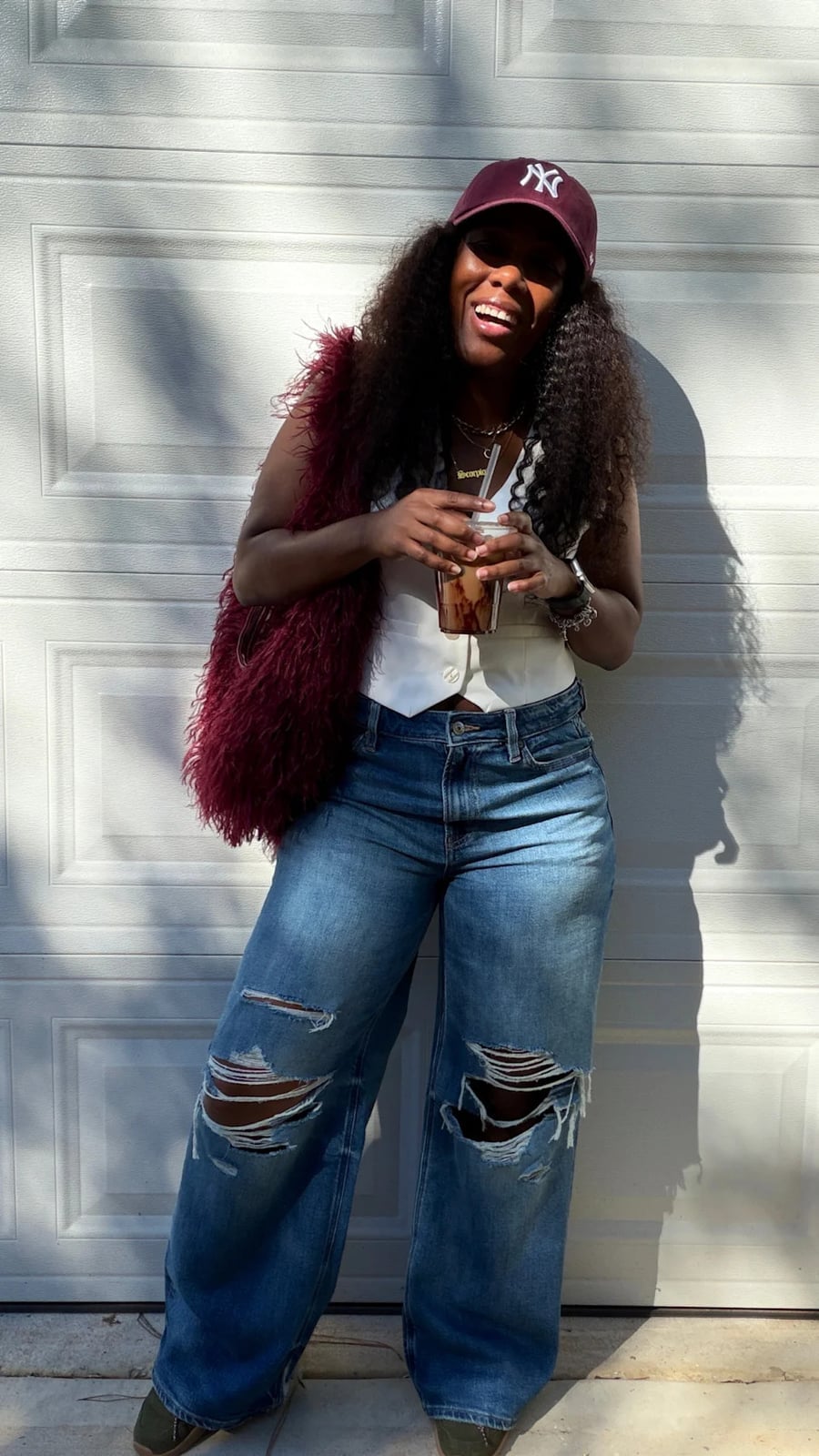 Burgundy Furry Vest With Wide Leg Jeans Burgundy Furry Vest With Wide Leg Jeans — Trendy Shoulder Bag Outfits