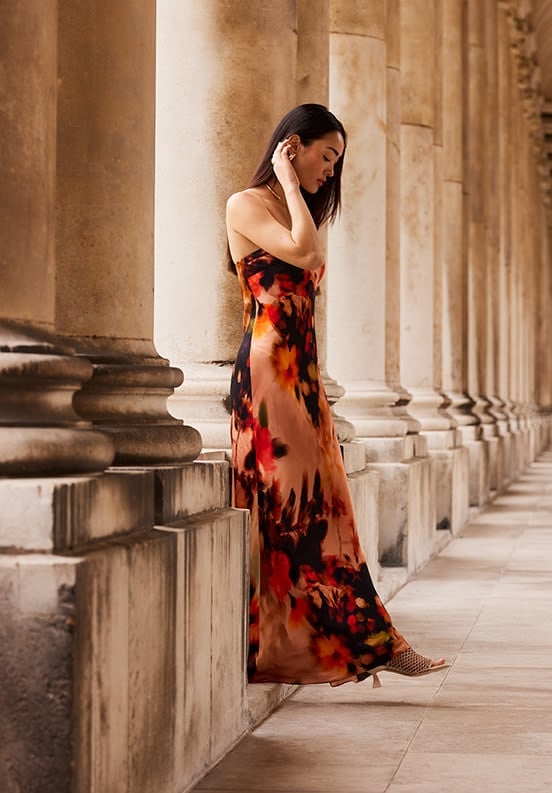 Peach Silk Maxi Dress with Floral Print and Flat, Close-Up Take — Trendy Silk Dresses Outfit