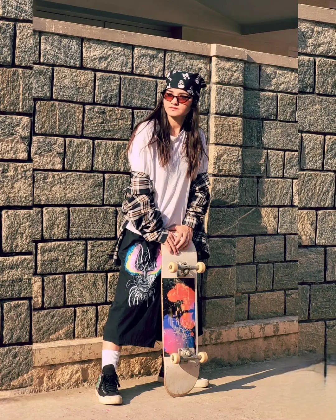Baggy Graphic Print Skirt with Plaid Flannel and High-Top Sneakers — Trendy Skater Outfits