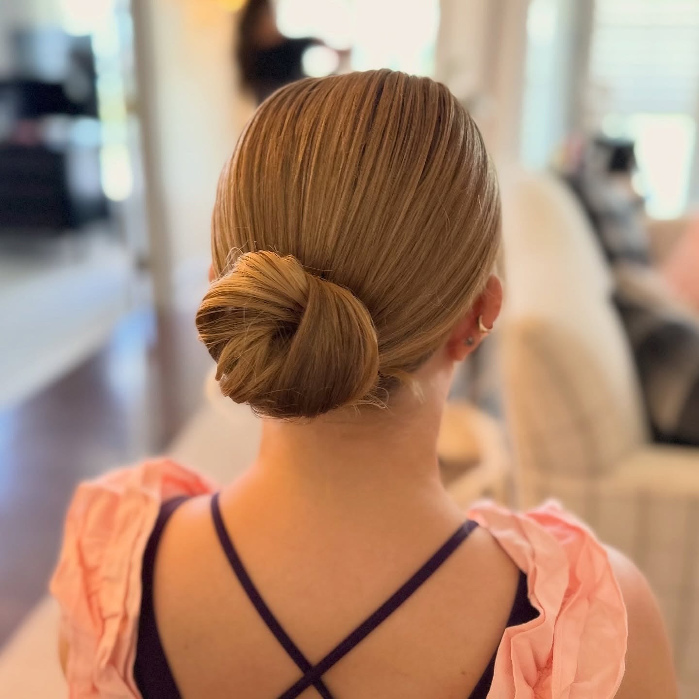Blonde Low Neat Bun — Trendy Slick Back Hairstyles