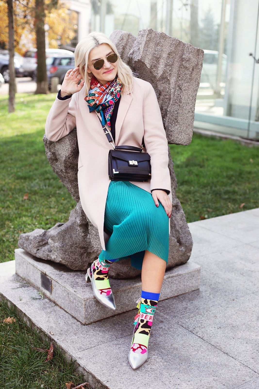 Colorful Patterned Socks Pop with a Pink Coat and Teal, Close-Up Take — Trendy Socks Outfits