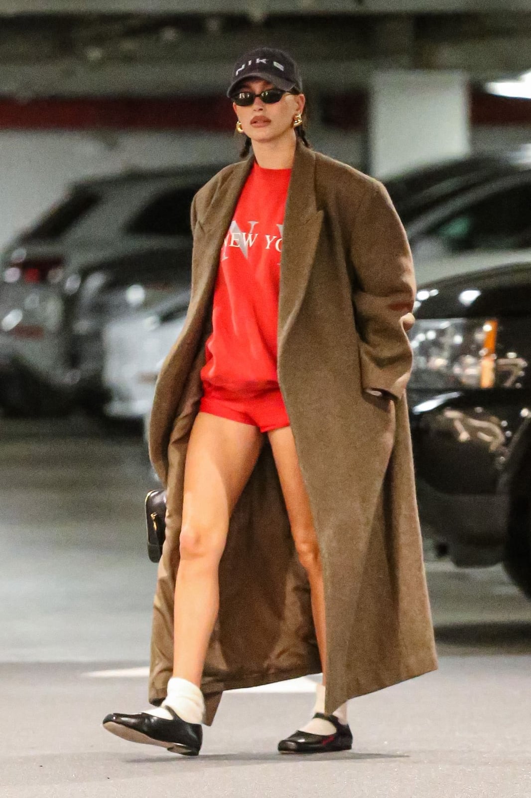White Socks Anchor a Sporty Sweatshirt and Mini Shorts Combo — Trendy Socks Outfits