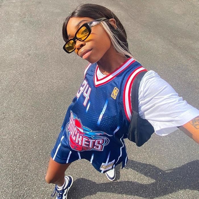 Basketball Jersey With Striped Shorts — Trendy Sporty Outfits