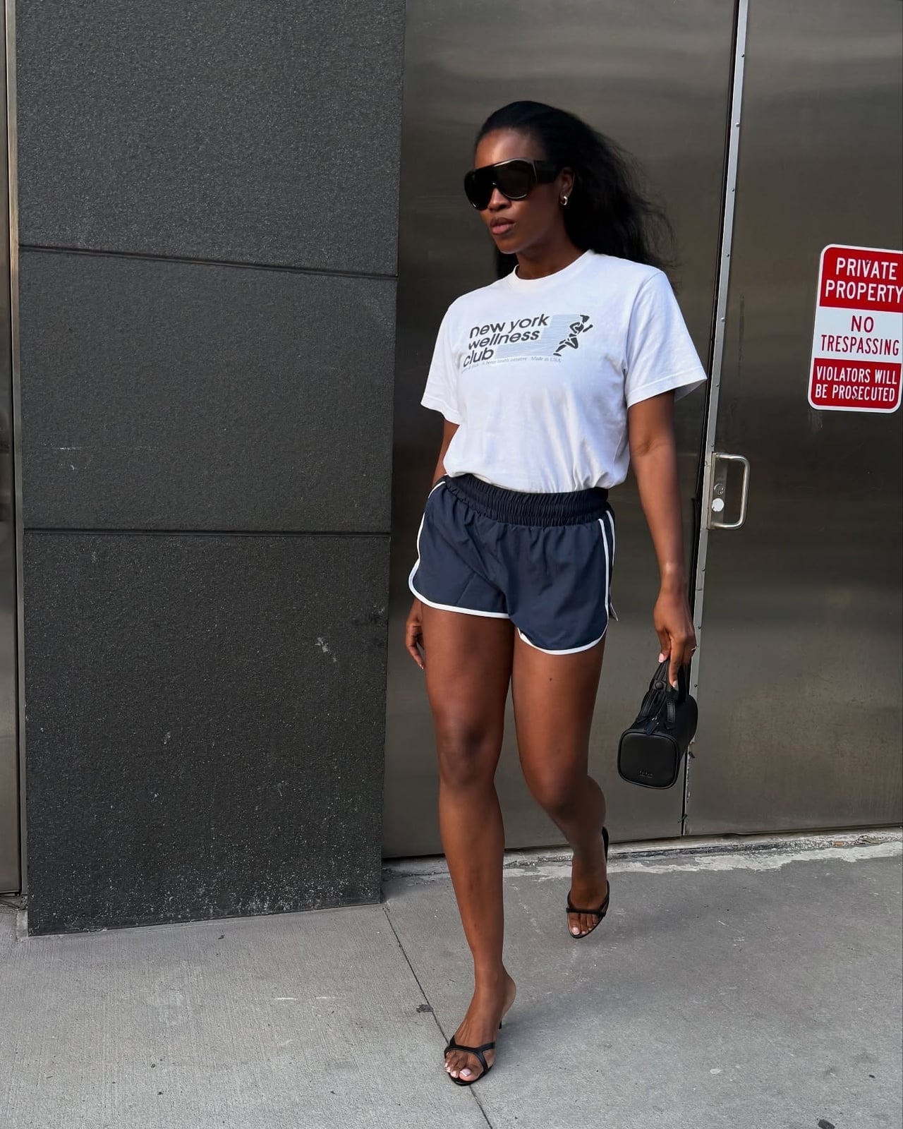 Graphic T-shirt With Athletic Shorts — Trendy Sporty Outfits