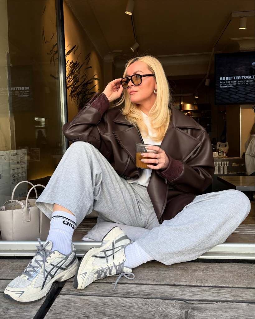 Faux Leather Jacket Adds Edge to Grey Sweatpants, Close-Up Take Faux Leather Jacket Adds Edge to Grey Sweatpants, Close-Up Take — Trendy Sweatpants Outfits