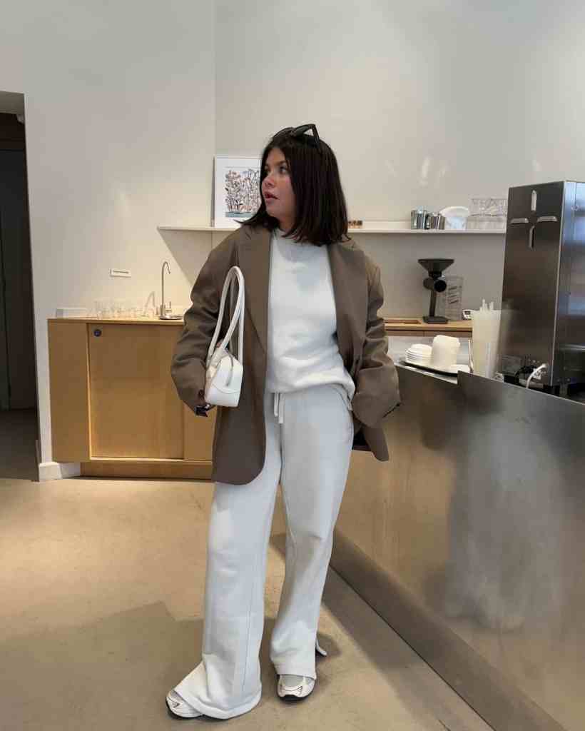 Brown Blazer Over White Sweatpants for Chic Casual, Close-Up Take Brown Blazer Over White Sweatpants for Chic Casual, Close-Up Take — Trendy Sweatpants Outfits