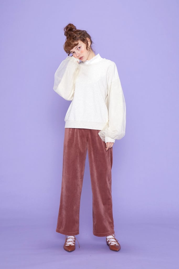 White Sweatshirt with Sheer Sleeves and Pink Corduroy Pants — Trendy Sweatshirt Outfits Women