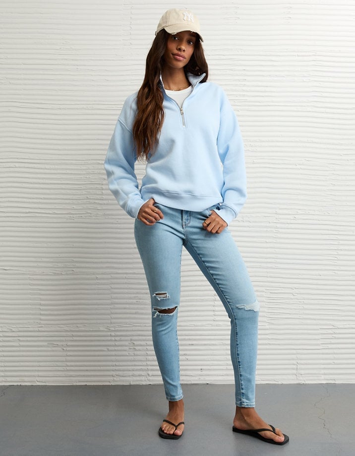 Light Blue Half-Zip Sweatshirt with Ripped Jeans — Trendy Sweatshirt Outfits Women
