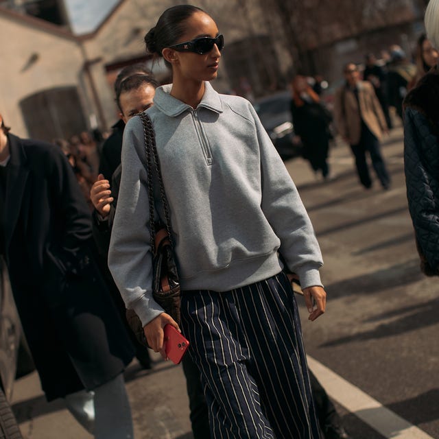 Grey Quarter-Zip Sweatshirt Over T-Shirt with Pinstripe Trousers — Trendy Sweatshirt Outfits Women