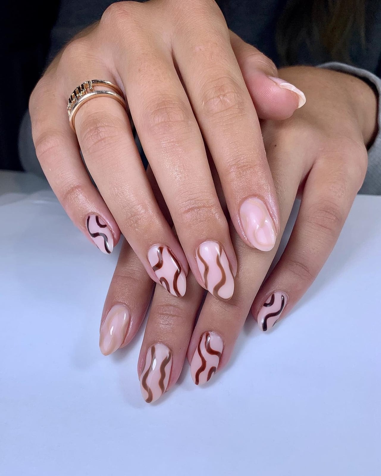Subtle Brown Swirls on Short Almond — Trendy Swirl Nails