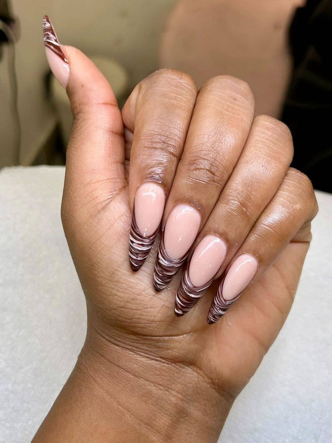 Chocolate Swirl French Tips on Long Almond, Glossy — Trendy Swirl Nails