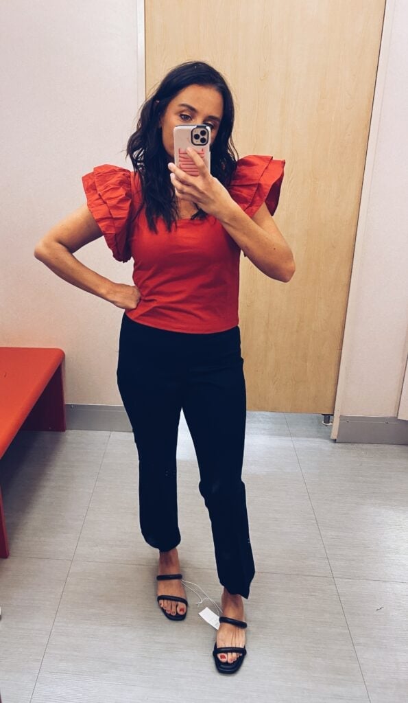 Red Ruffled Sleeve Top with Black Trousers Red Ruffled Sleeve Top with Black Trousers — Trendy Teacher Outfits Elementary