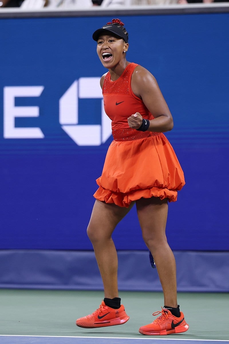 Orange Sleeveless Tennis Dress with Bubble Hem — Trendy Tennis Outfits