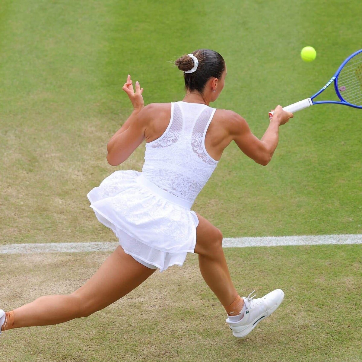 White Lace-Trimmed Tennis Dress in Motion — Trendy Tennis Outfits