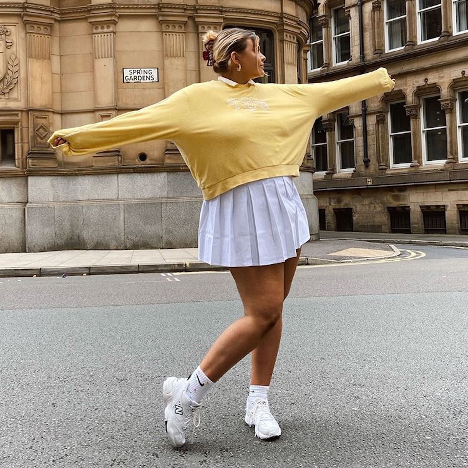 Yellow Oversized Sweatshirt with White Pleated Mini Skirt — Trendy Tennis Outfits