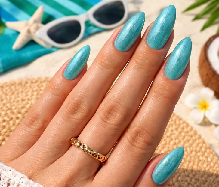 Shimmering Turquoise Metallic Sheen Almond Nails Shimmering Turquoise Metallic Sheen Almond Nails — Trendy Turquoise Nails