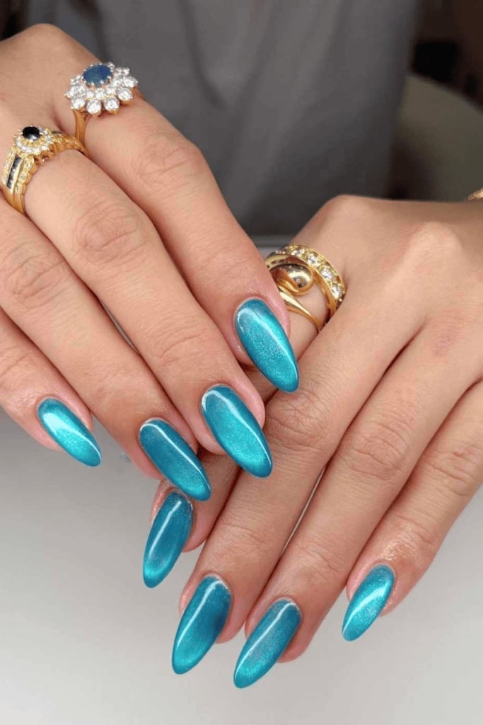 Bright Teal Cat-Eye Effect Medium Almond Nails Bright Teal Cat-Eye Effect Medium Almond Nails — Trendy Turquoise Nails
