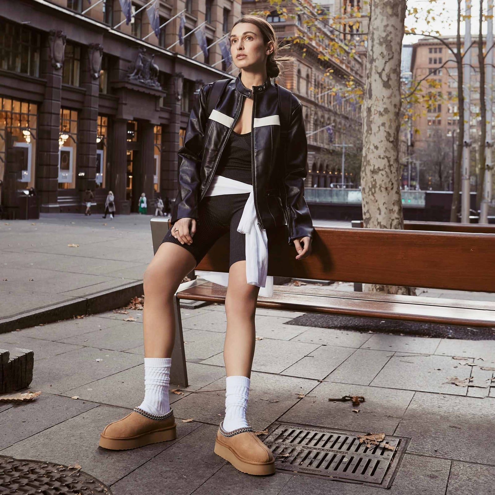 Leather Jacket and Bodysuit with Platform Ugg Slippers, Close-Up Take — Trendy Uggs Outfits