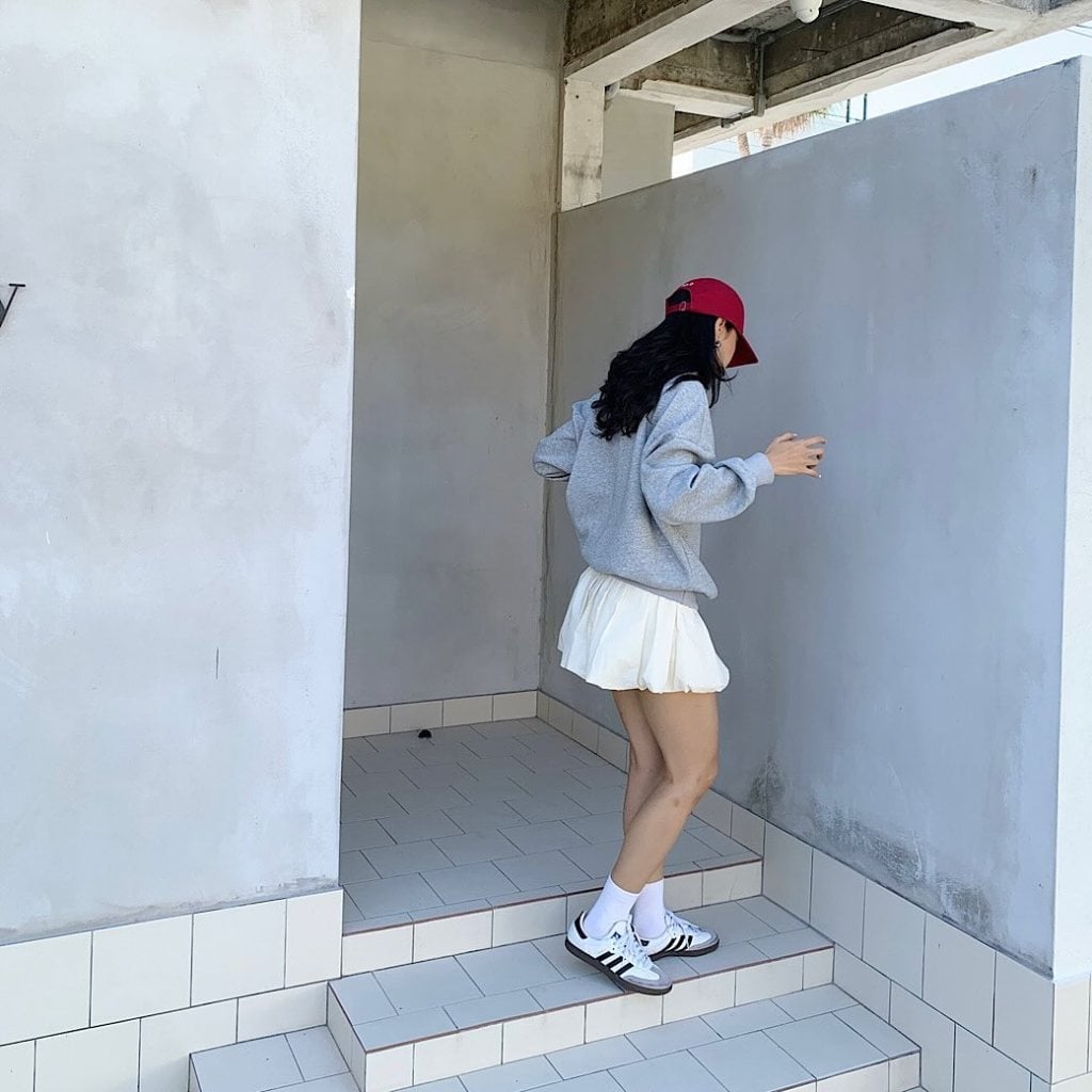 Grey Sweatshirt with White Pleated Mini Skirt — Trendy Uni Outfits