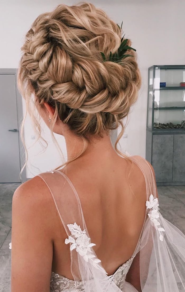 Braided Updo With Loose Tendrils Braided Updo With Loose Tendrils — Trendy Wedding Guest Updos