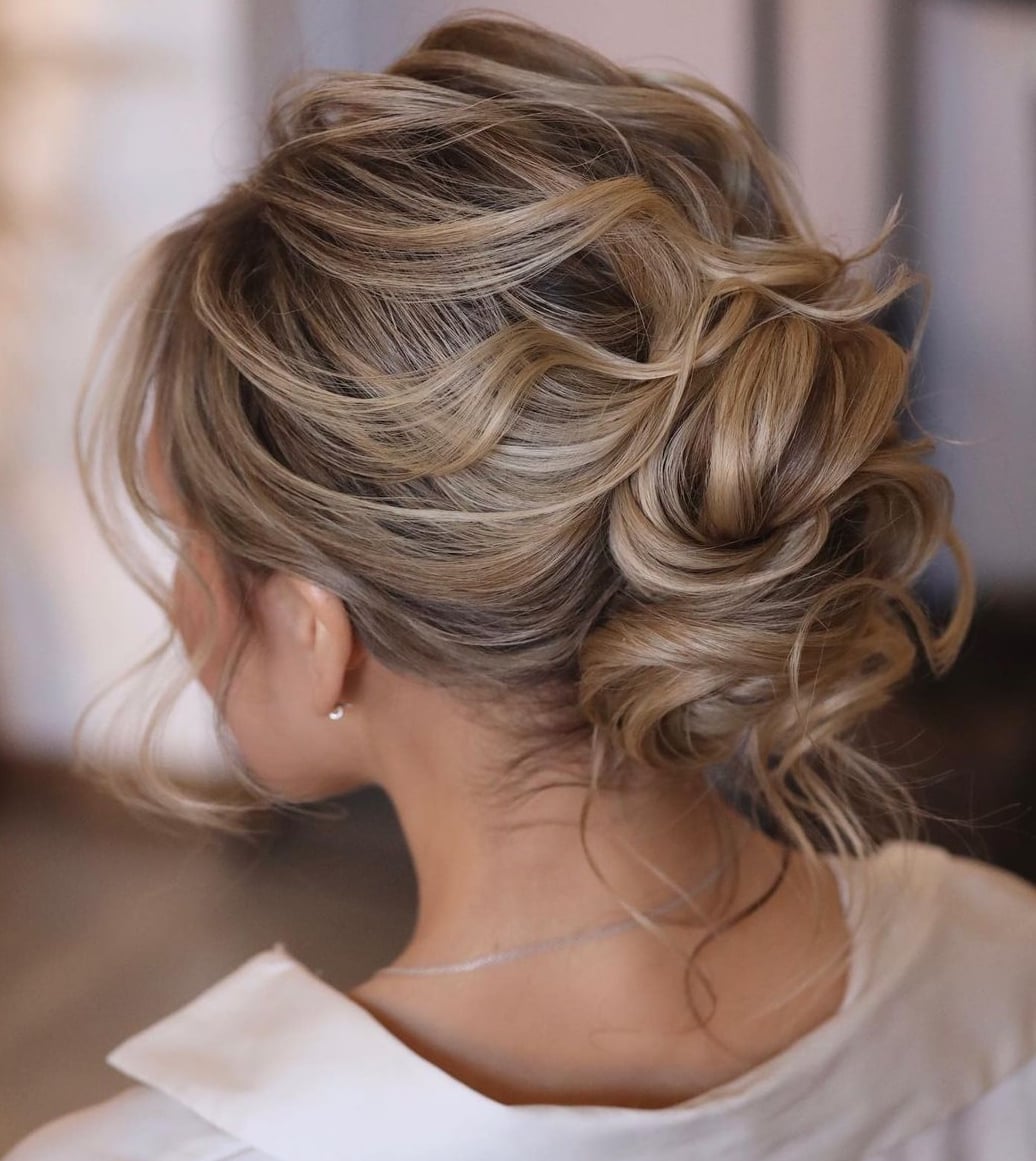 Voluminous Loose Updo With Ash Blonde Voluminous Loose Updo With Ash Blonde — Trendy Wedding Guest Updos