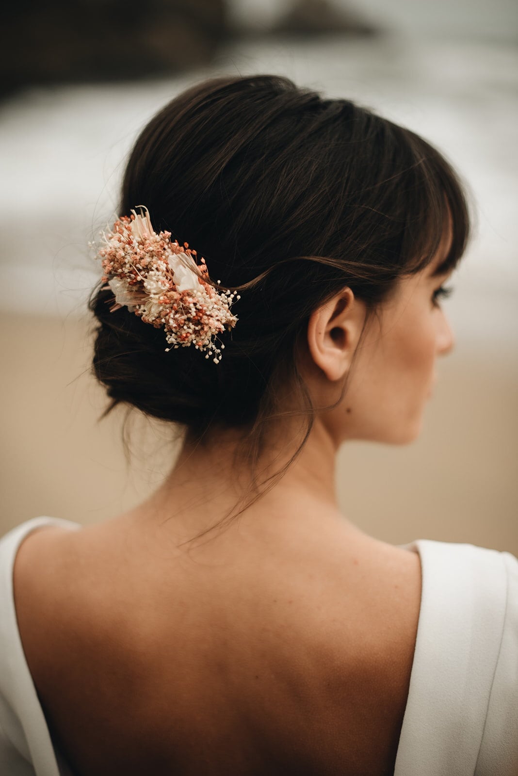 Polished Low Bun With Accessory — Trendy Wedding Hair