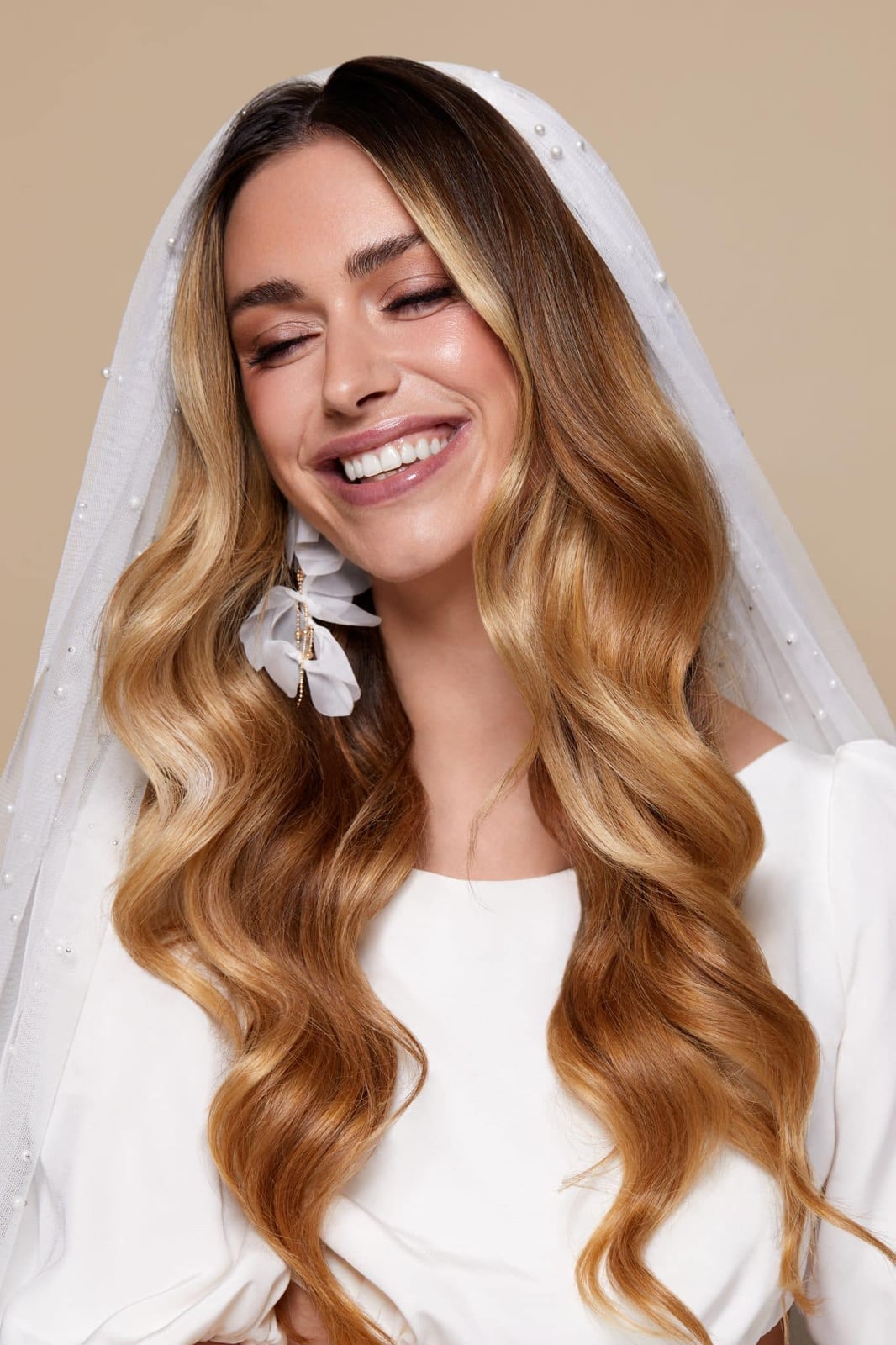 Long Loose Waves With Curtain Bangs — Trendy Wedding Hair
