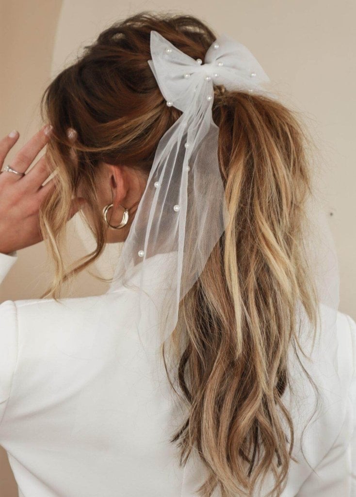 Long High Ponytail With Veil Bow — Trendy Wedding Hair