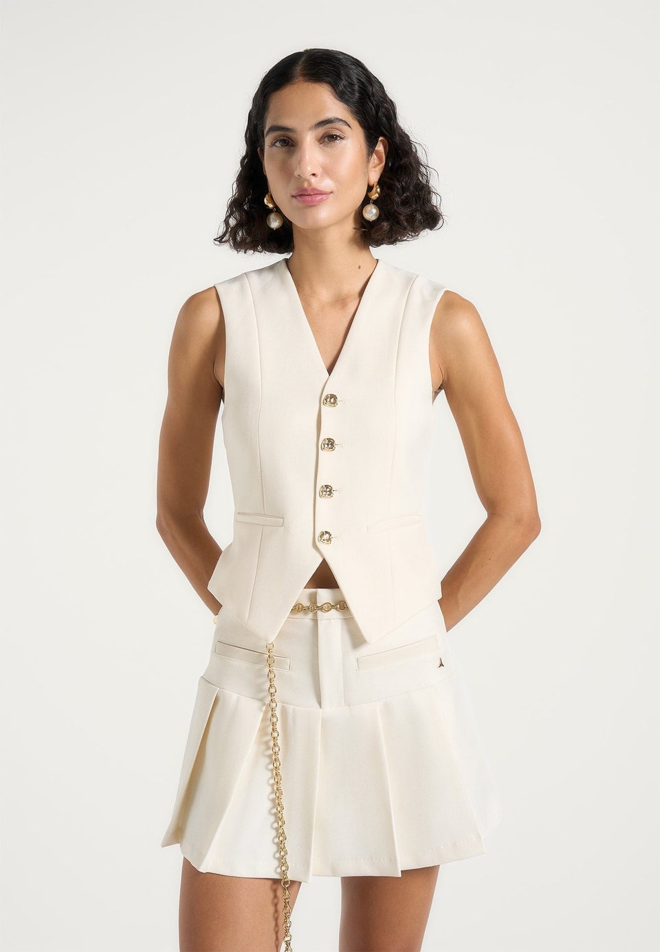 Off-white Vest and Pleated Skirt with Chain Belt Off-white Vest and Pleated Skirt with Chain Belt — Trendy White Vest Outfit
