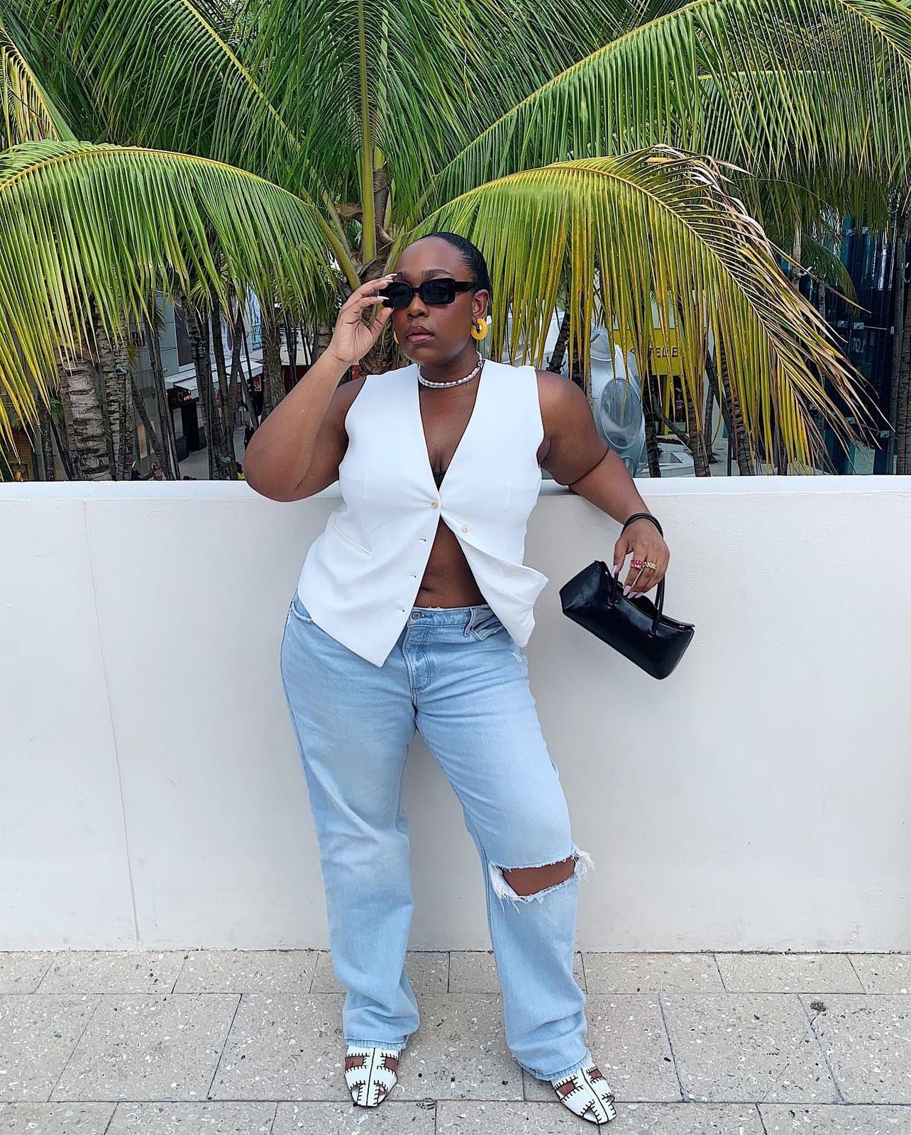 White Vest Over Denim Shirt with Ripped Jeans White Vest Over Denim Shirt with Ripped Jeans — Trendy White Vest Outfit