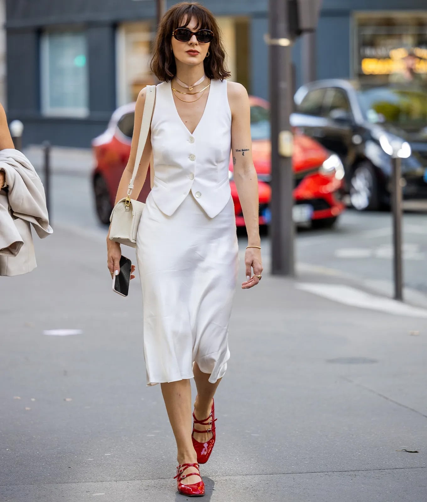 Street Style White Vest Over a Satin Slip Dress Street Style White Vest Over a Satin Slip Dress — Trendy White Vest Outfit