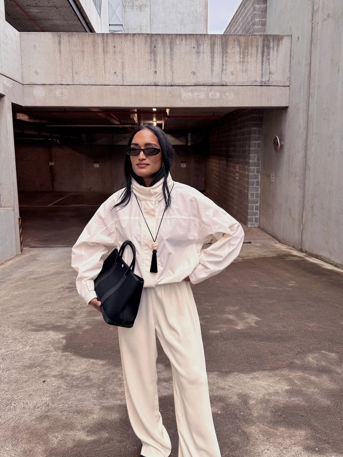 Chic Ivory Windbreaker With Silk Camisole and Oversized Jacket Chic Ivory Windbreaker With Silk Camisole and Oversized Jacket — Trendy Windbreaker Outfits