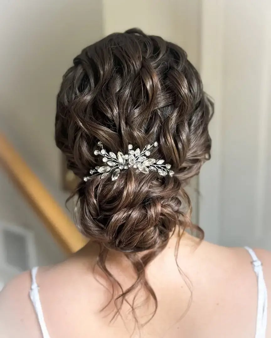 Dark Brown Curly Updo With Sparkling Hair Accessory Dark Brown Curly Updo With Sparkling Hair Accessory — Wedding Bun Ideas