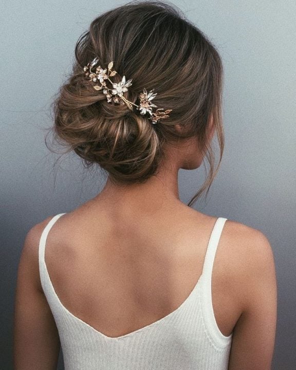 Blonde Messy Updo With Hair Vine Blonde Messy Updo With Hair Vine — Wedding Bun Ideas