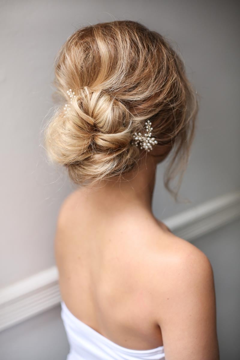 Medium Blonde Romantic Bun With Wispy Bangs Medium Blonde Romantic Bun With Wispy Bangs — Wedding Bun Ideas
