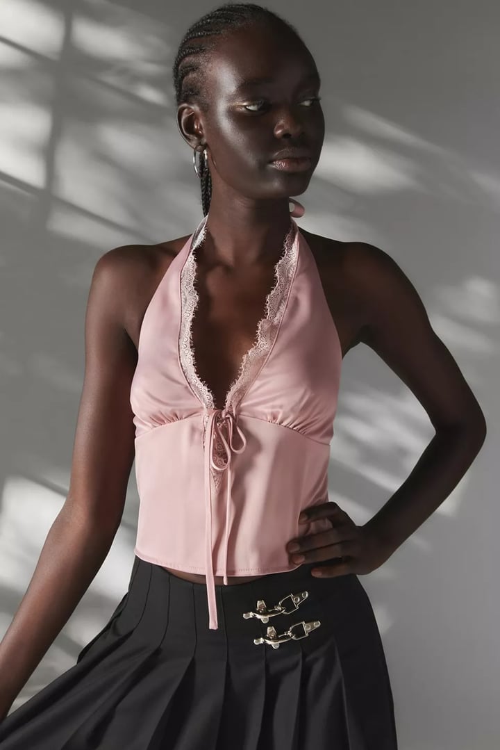 Pink Satin Halter Top and Black Pleated Skirt Pink Satin Halter Top and Black Pleated Skirt — Y2K Party Outfit Inspiration